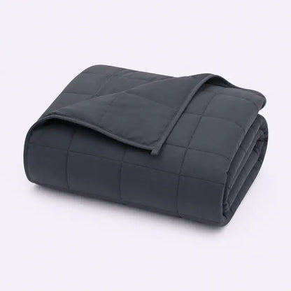 Couverture lestée grise Étreinte pliée avec matelassage compartimenté et répartition uniforme du poids