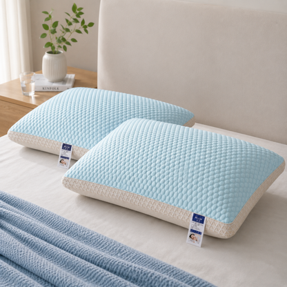 Coussin rafraîchissant bleu intégré dans une literie haut de gamme pour des nuits plus confortables pendant les périodes de chaleur.
